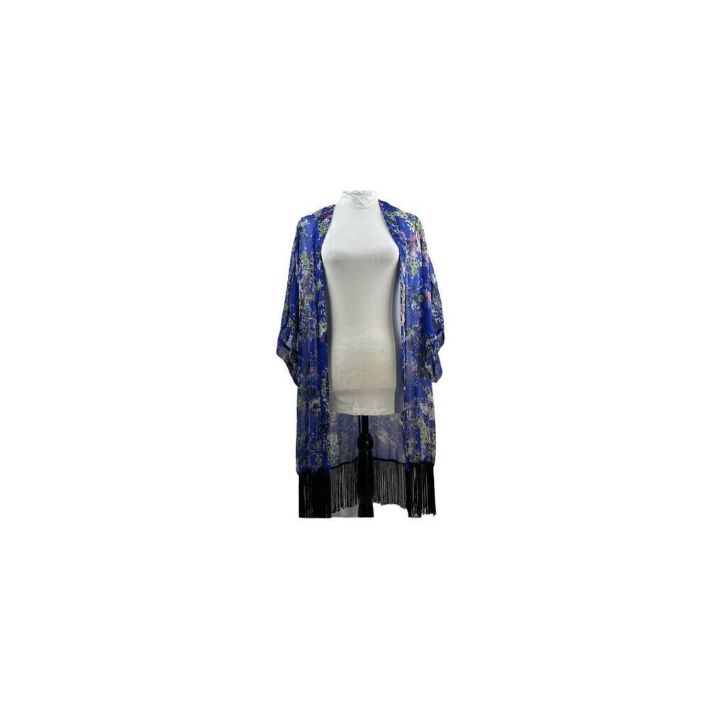 Cardigan with fringe at the bottom sheer  . On a size six mannequin